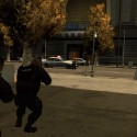 The SWAT team moves in to secure the area in front of the bank. | Views: 3179