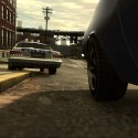 Niko tails a police car over a curb. | Views: 3042