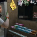 Guy buying a drink. | Views: 2578